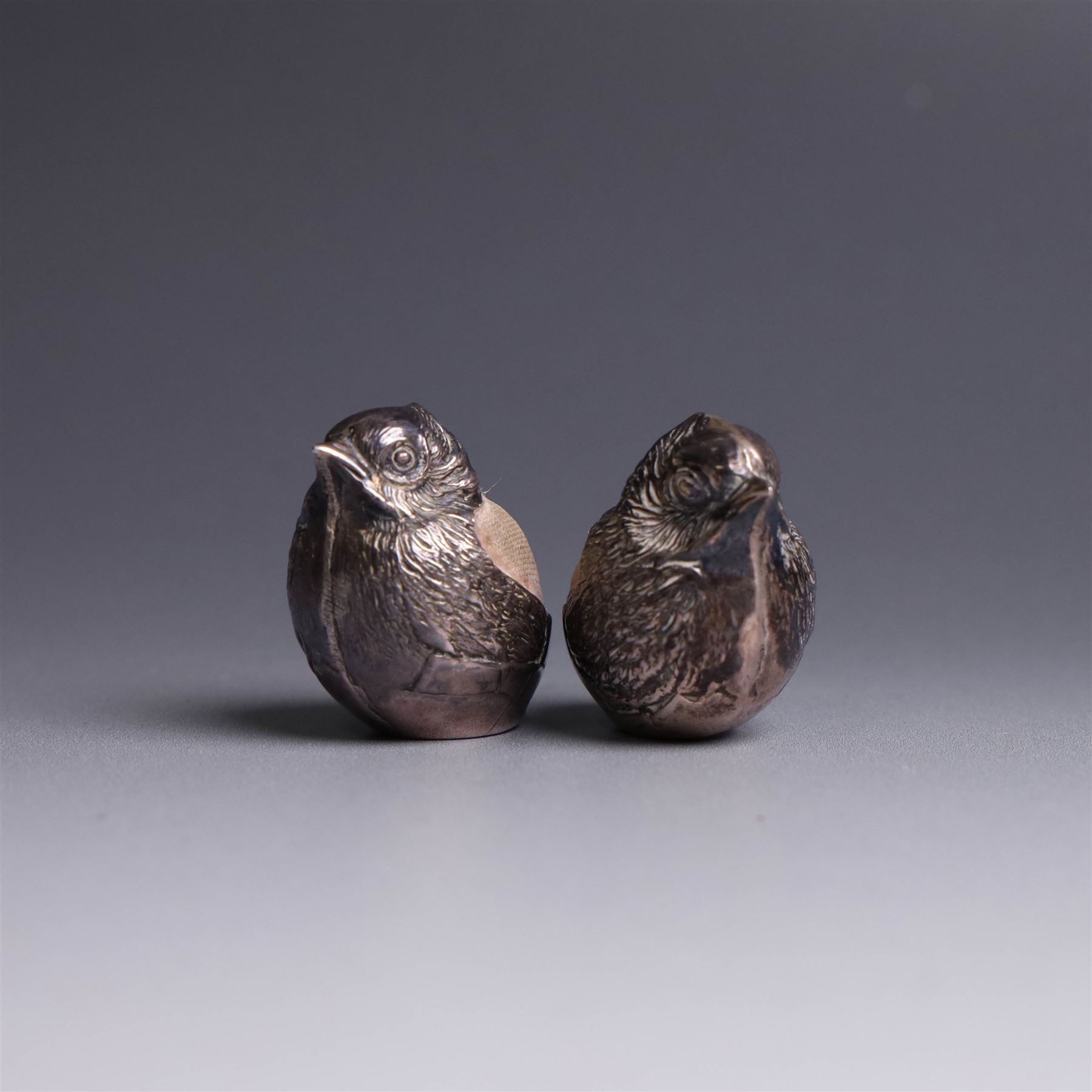Two Edwardian novelty silver chick pin cushions, hallmarked Sampson Mordan & Co Ltd, Chester 1907