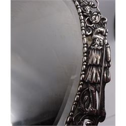 Continental silver miniature dressing table/wall mirror, of oval form with bevelled mirror plate, surrounded by a bead and dart rim, with pierced scrolling floral border with a standing cavalier to either side and the bust of a cavalier to the base, H17.7cm