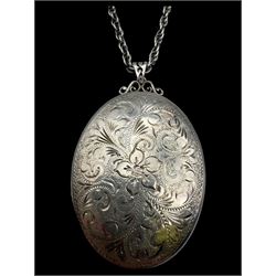 15ct gold swallow brooch, 9ct gold stone set cluster ring and a silver locket pendant, all hallmarked 