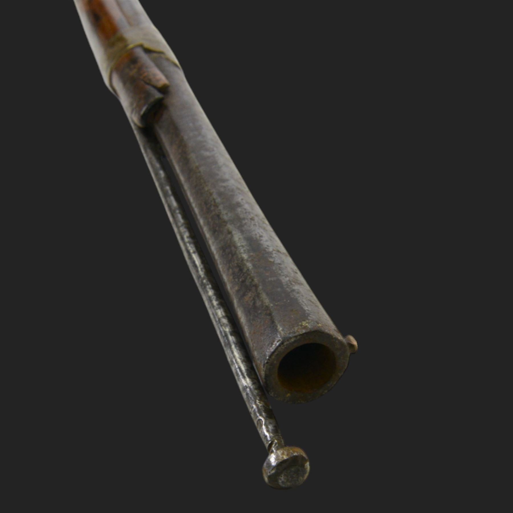 Middle Eastern percussion cap rifle, the 107cm  barrel with four brass bands and ramrod under, overall L143cm, together with another percussion rifle the 106cm barrel a copy of a 17th century Spanish barrel, complete with fake stamp, by vendors repute this rifle was confiscated from tribesmen in Kurdistan by police
Sold as an exempt item under Section 58 (2) of the 1968 Firearms Act, to be held as a curiosity or ornament