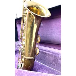 Brass tenor saxophone by Adolphe SAX, 84 Rue Myrha, Paris,  No.938 serial number 12097, H75cm excluding crook; in hard carrying case bearing plaque for Henri Selmer