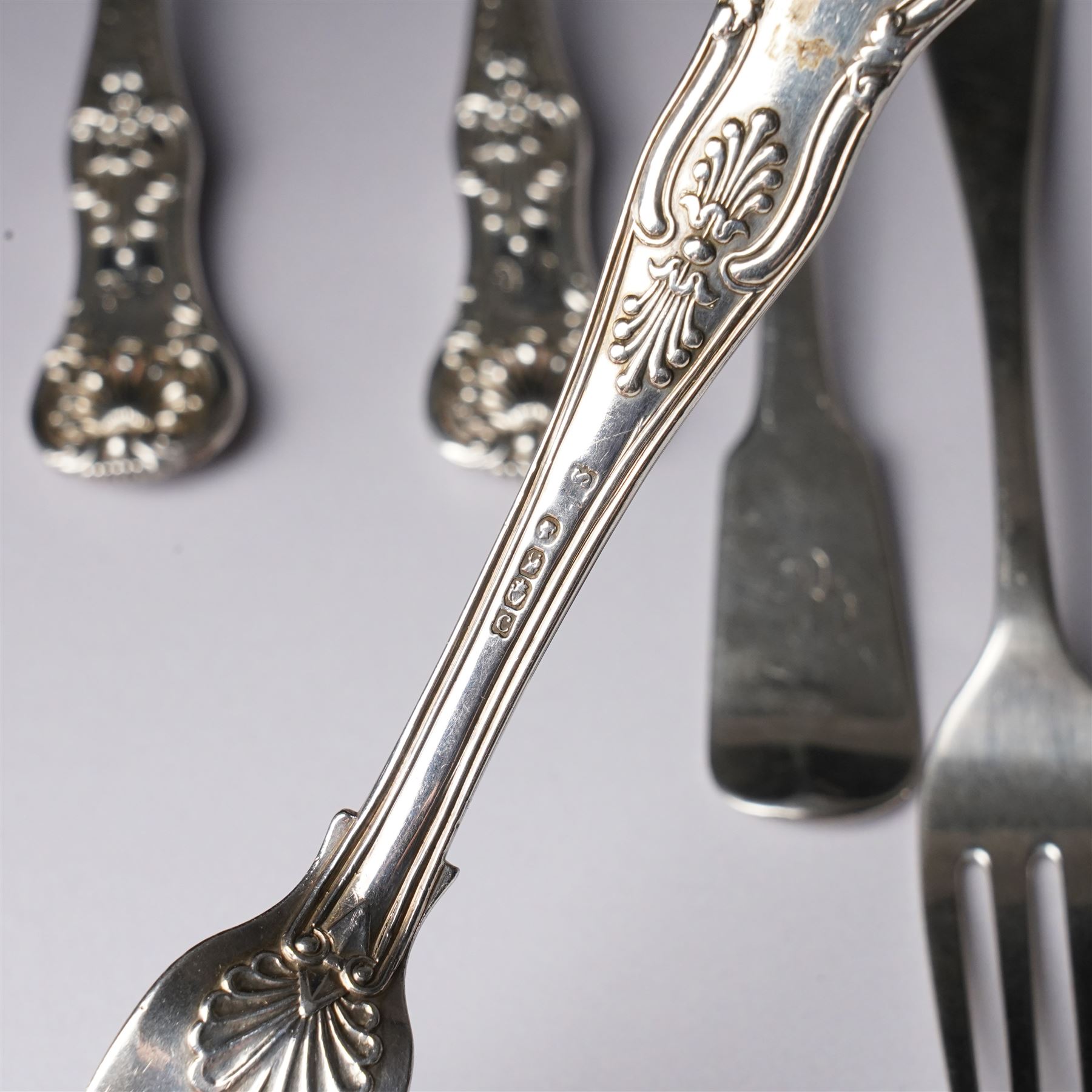 Pair of George IV silver fiddle pattern dessert forks, London 1824, another pair London 1828 and seven other 19th century silver dessert forks various dates and makers (11)