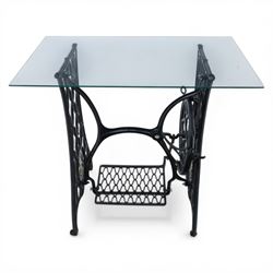 Sewing machine table with glass top, with Singer wrought metal base and foot pedal