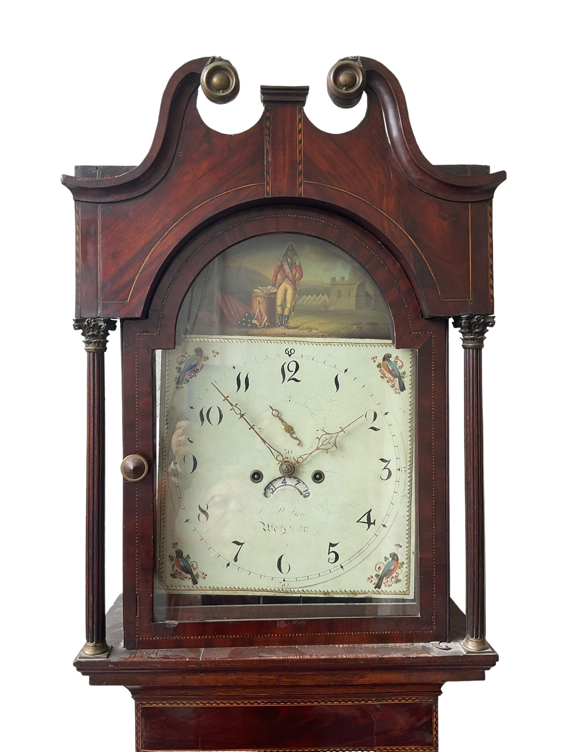 Oak and Mahogany - 8-day longcase clock c1830 with a swan necked pediment and break arch hood door beneath flanked by reeded pilasters with Corinthian capitals,  trunk with three quarter reeded columns and a short door with canted corners, on a conforming plinth with a raised panel, painted dial with Arabic numerals, painted birds to the spandrels and a depiction of a soldier and encampment to the arch, with subsidiary calendar aperture and seconds dial, makers name indistinct, with a rack striking movement striking the hours on a bell.  No weights or pendulum.