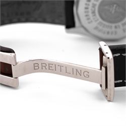Breitling Chrono Cockpit gentleman's stainless steel diamond set automatic wristwatch, Ref. A13357, serial No. 2084732, cream dial with Roman numeral hour markers and date aperture, diamond set unidirectional rotating bezel, on Breitling brown leather strap, with fold-over clasp