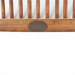 Set of eight 19th century ash and elm spindle back Windsor armchairs, arched top rails above fan-shaped spindle backs, curved arms with turned supports, shaped saddle seats, on turned legs joined by H-stretchers
