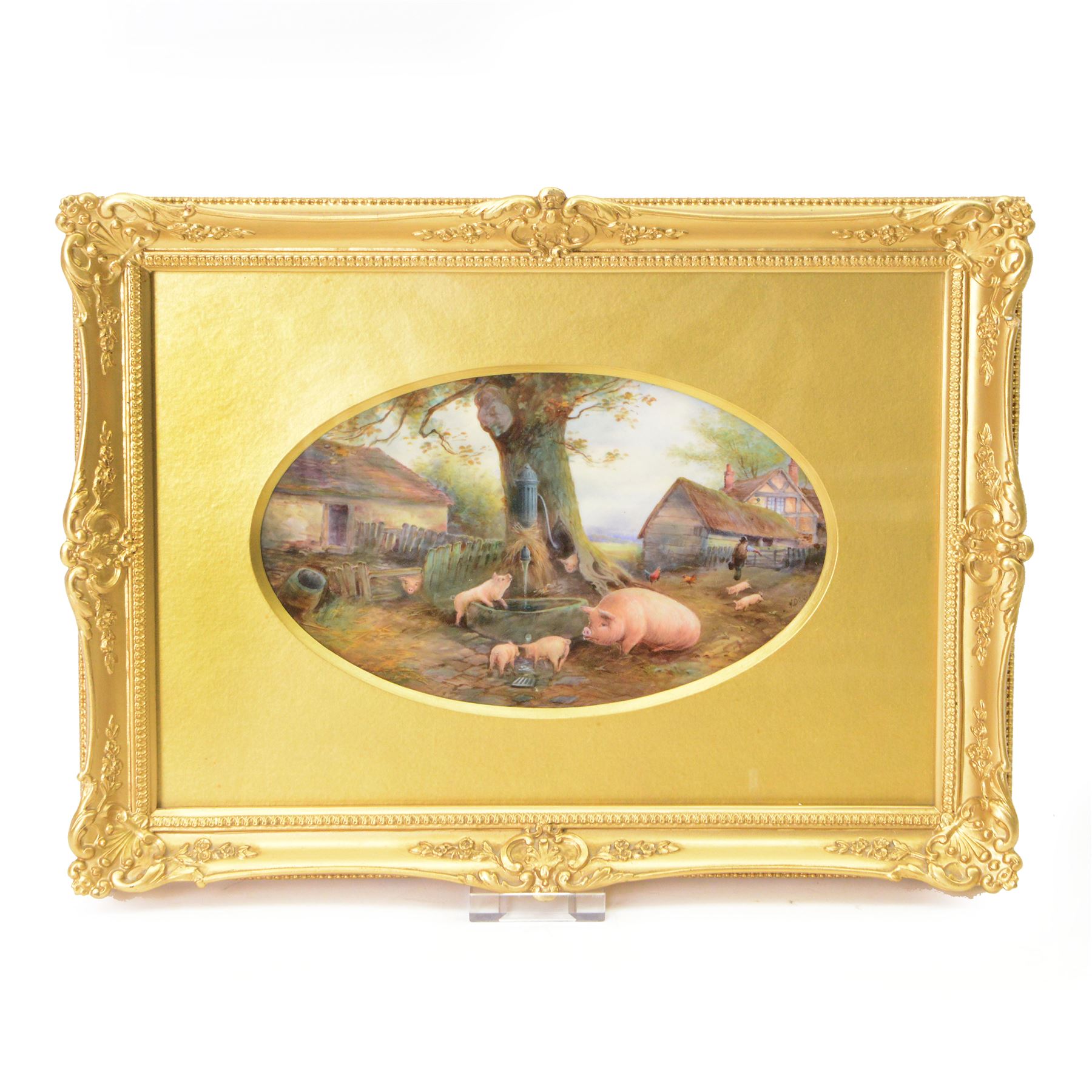 Turn of the century Royal Worcester oval plaque, hand painted by Harry Davis, depicting a farmyard scene with pigs and piglets watering at a stone trough, with farm and buildings in the background, signed H Davis, with puce printed mark verso, date code for 1900, plaque 14.5cm x 23cm, overall 30cm x 38.5cm

Note: Pigs are a rare subject to see on Royal Worcester. Harry Davis was the only artist approved to paint them.
Most known examples show the same composition, based upon a sketch done by the artist during a single visit to a local farm.
