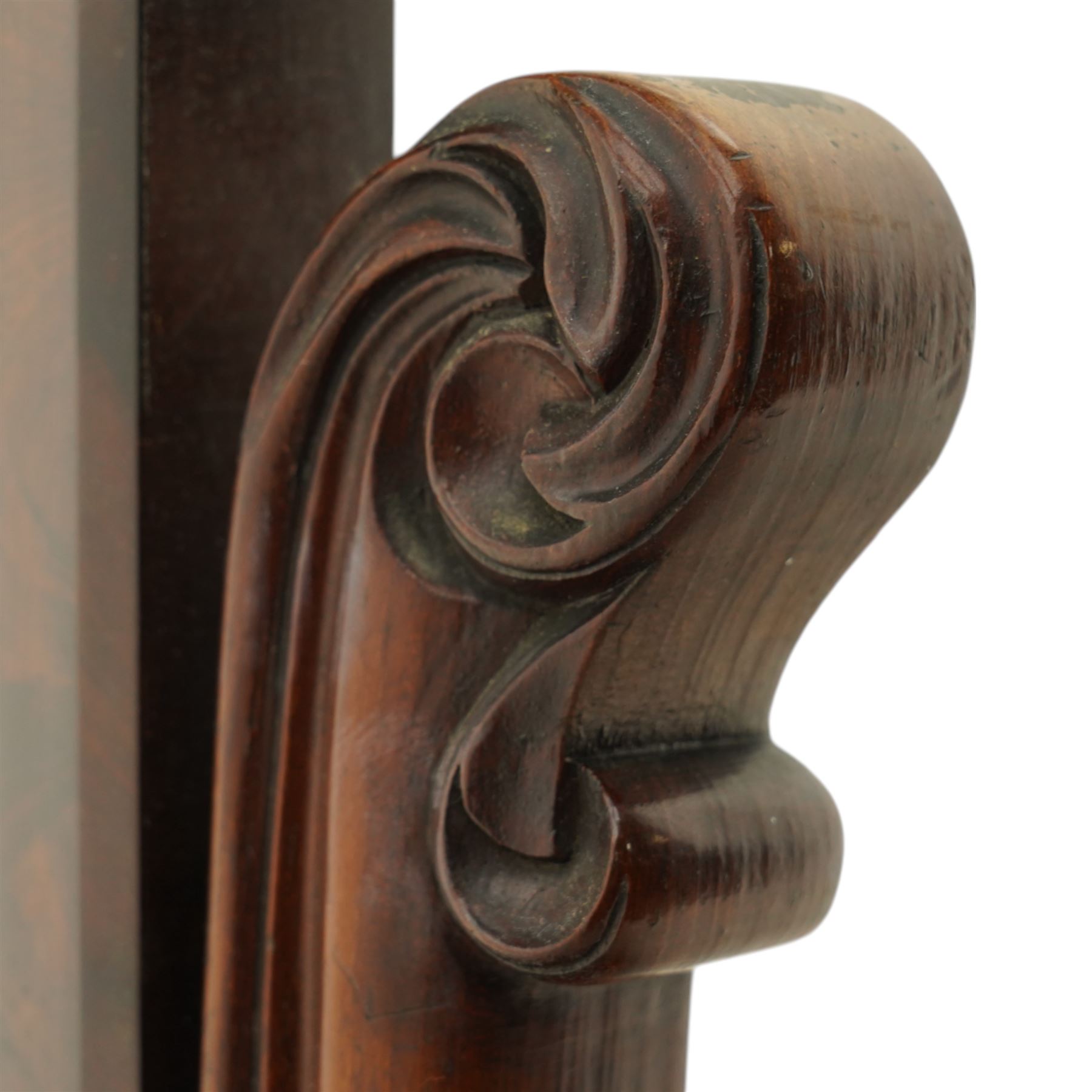 Ornate Victorian mahogany dressing table mirror, of rectangular form with rounded corners, mounted within a carved wooden frame with elaborate foliate scrolled supports, on scrolled feet 