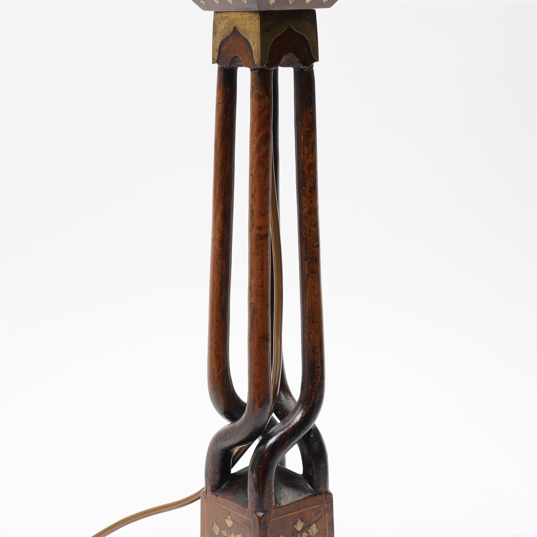 Early 20th century Arts and Crafts style Anglo-Indian table lamp, with open twist stem and gilt brass inlaid trailing vine and repeating arch pattern overall H53cm