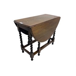 20th century oak drop-leaf dining table on spiral turned supports 