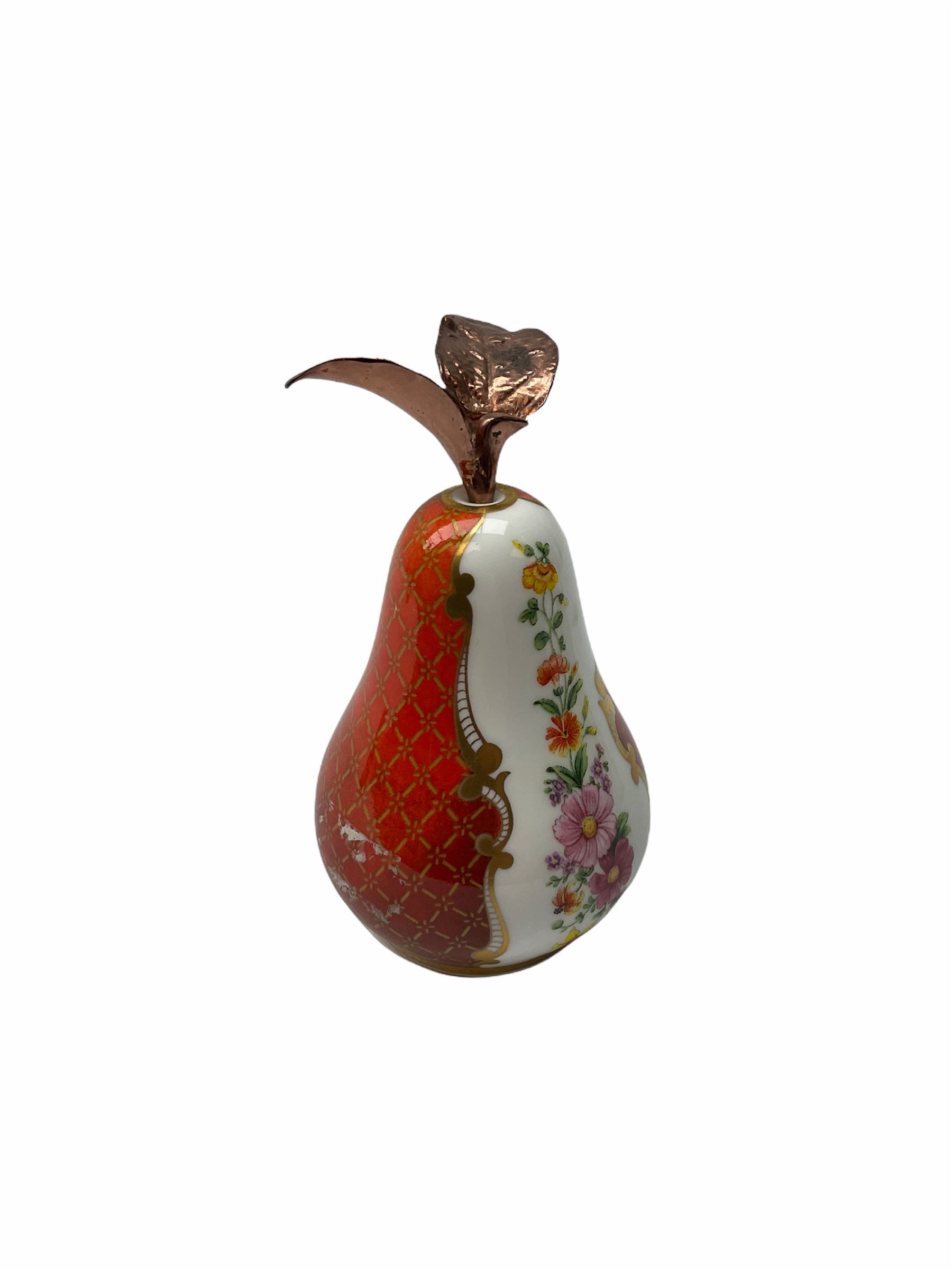 Three Royal Worcester candle snuffers, in the form of a pear, a pineapple and a champagne bottle from the Millennium Collection, the tallest H12cm all with printed mark.  