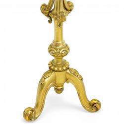 Late 19th century giltwood torchère stand, circular top with beaded moulded edge, on a turned and carved column with scrolling acanthus detail, raised on three cabriole supports with leaf carving and scroll feet
