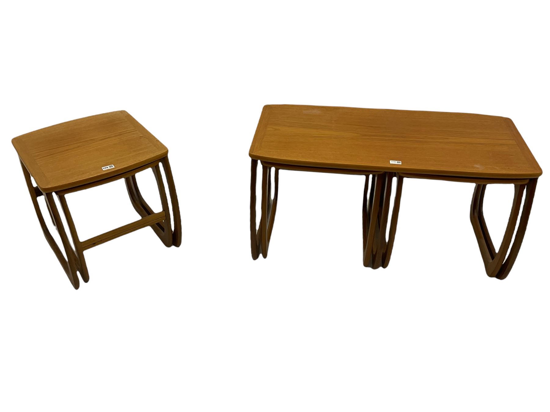 Nathan - teak Long John nest of tables and a singular nest of tables 