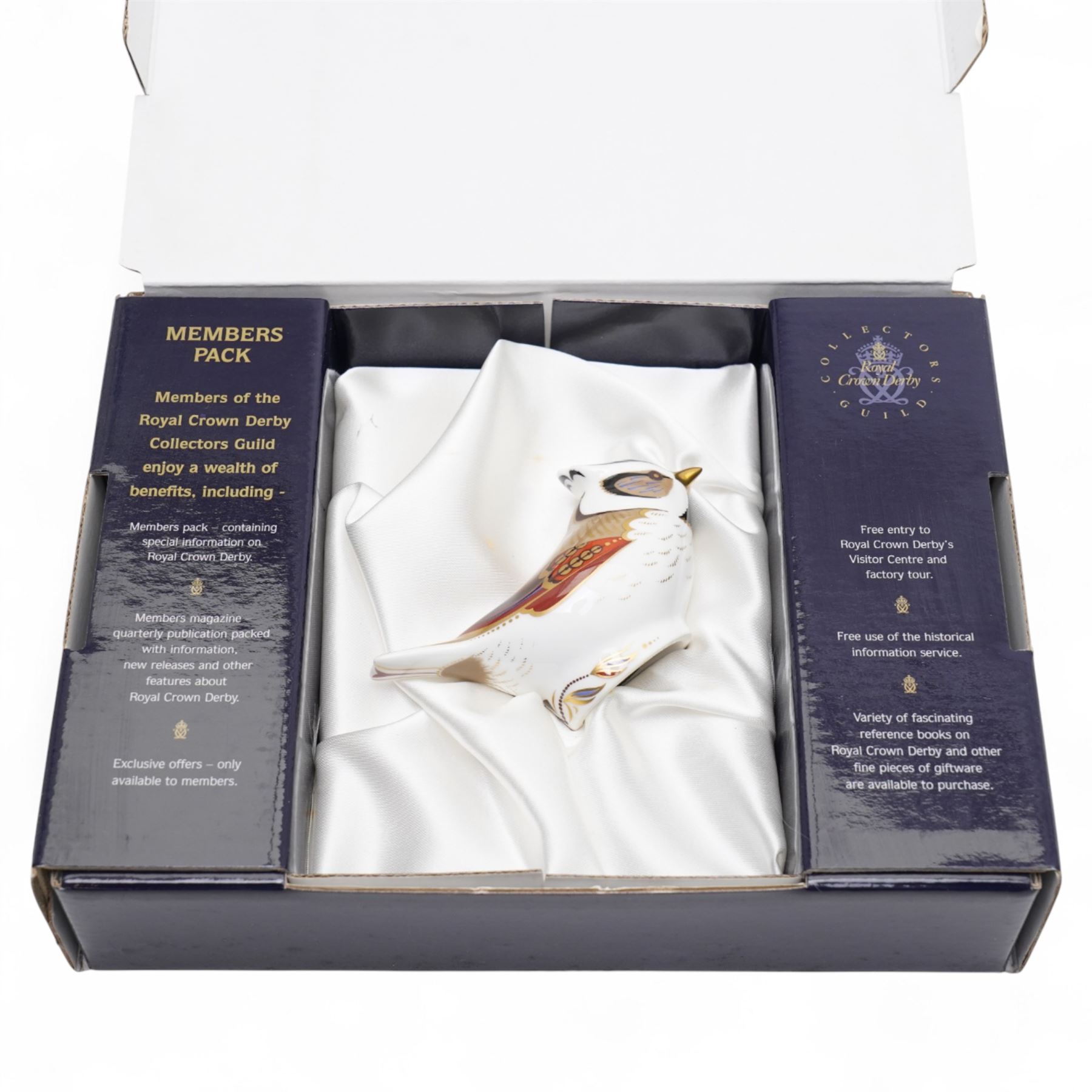 Four Royal Crown Derby paperweights, comprising crested Tit with original box and gold stopper, Robin with silver stopper, Blue Tit with gold stopper, and Jenny Wren (4)