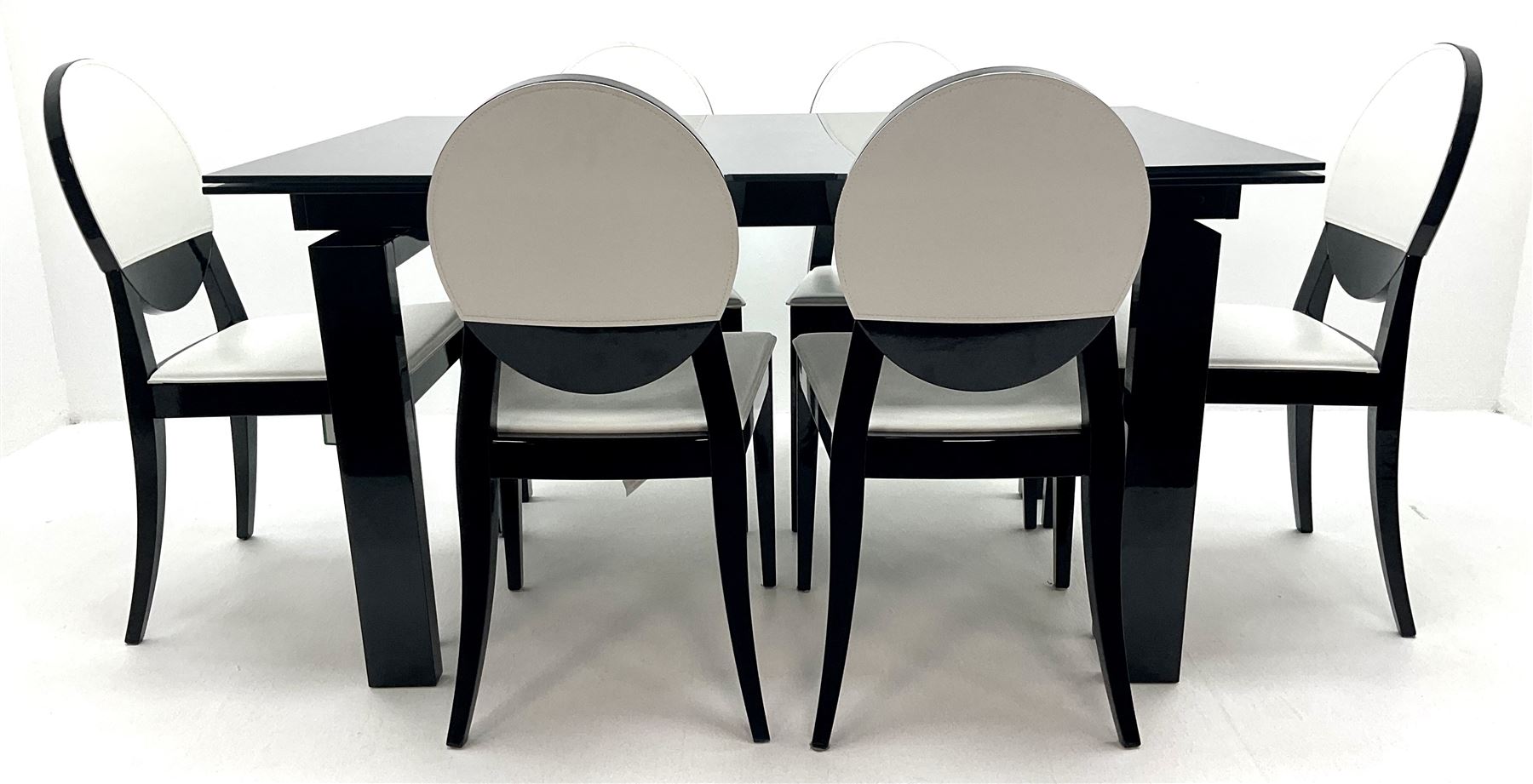 Ponsfords Sheffield Italian black gloss and glass extending dining table, rectangular supports (W220cm & 140cm, H77cm, D90cm) and set six chairs black and white dining chairs (W48cm)