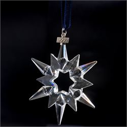 Eight Swarovski crystal snowflake Christmas ornaments, comprising years 1991-1998, some with certificates, boxed (8)
