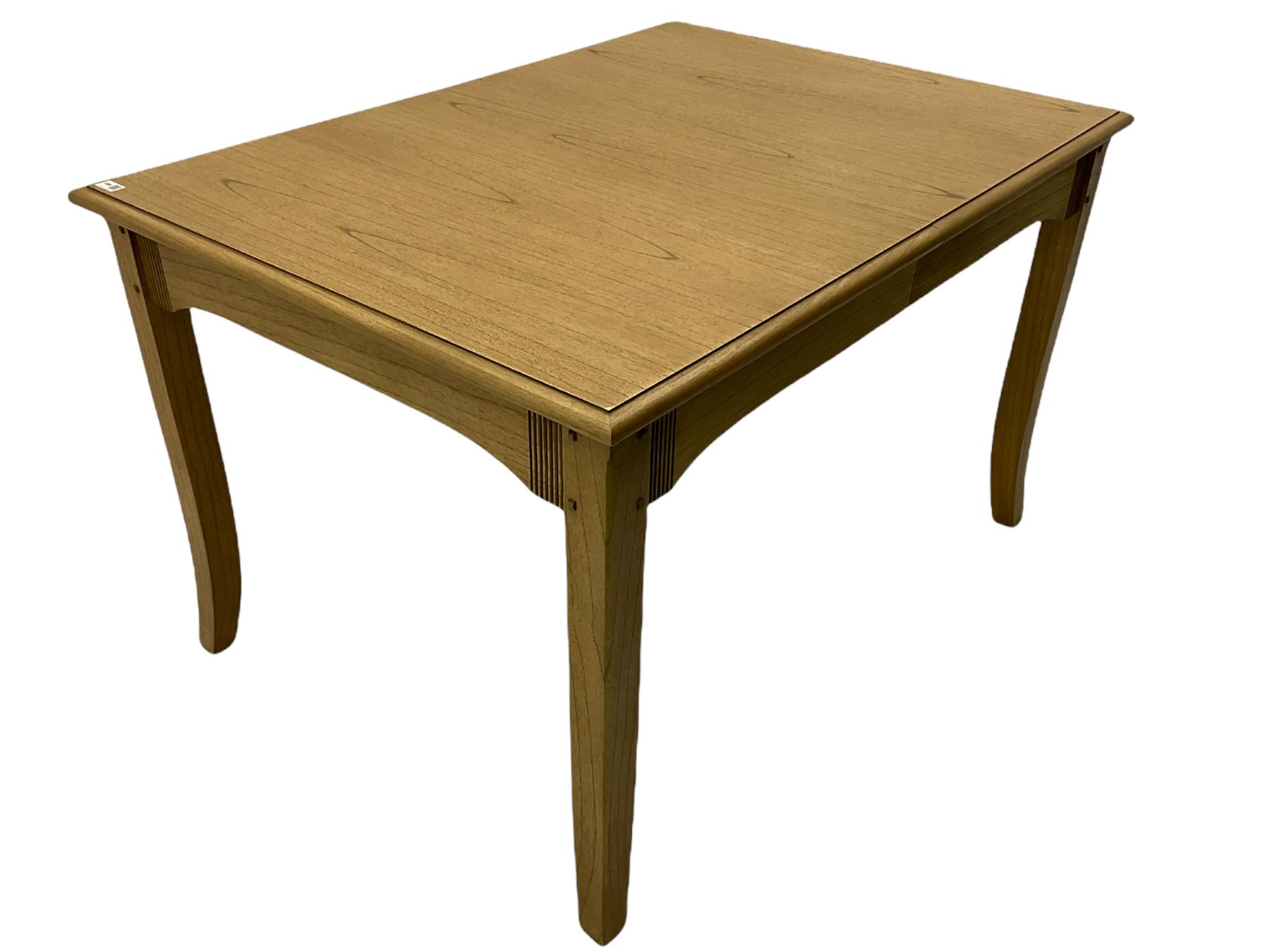 Windsor by Mark Devany oak rectangular extending dining table, with butterfly leaf, and four chairs with upholstered seats and backs