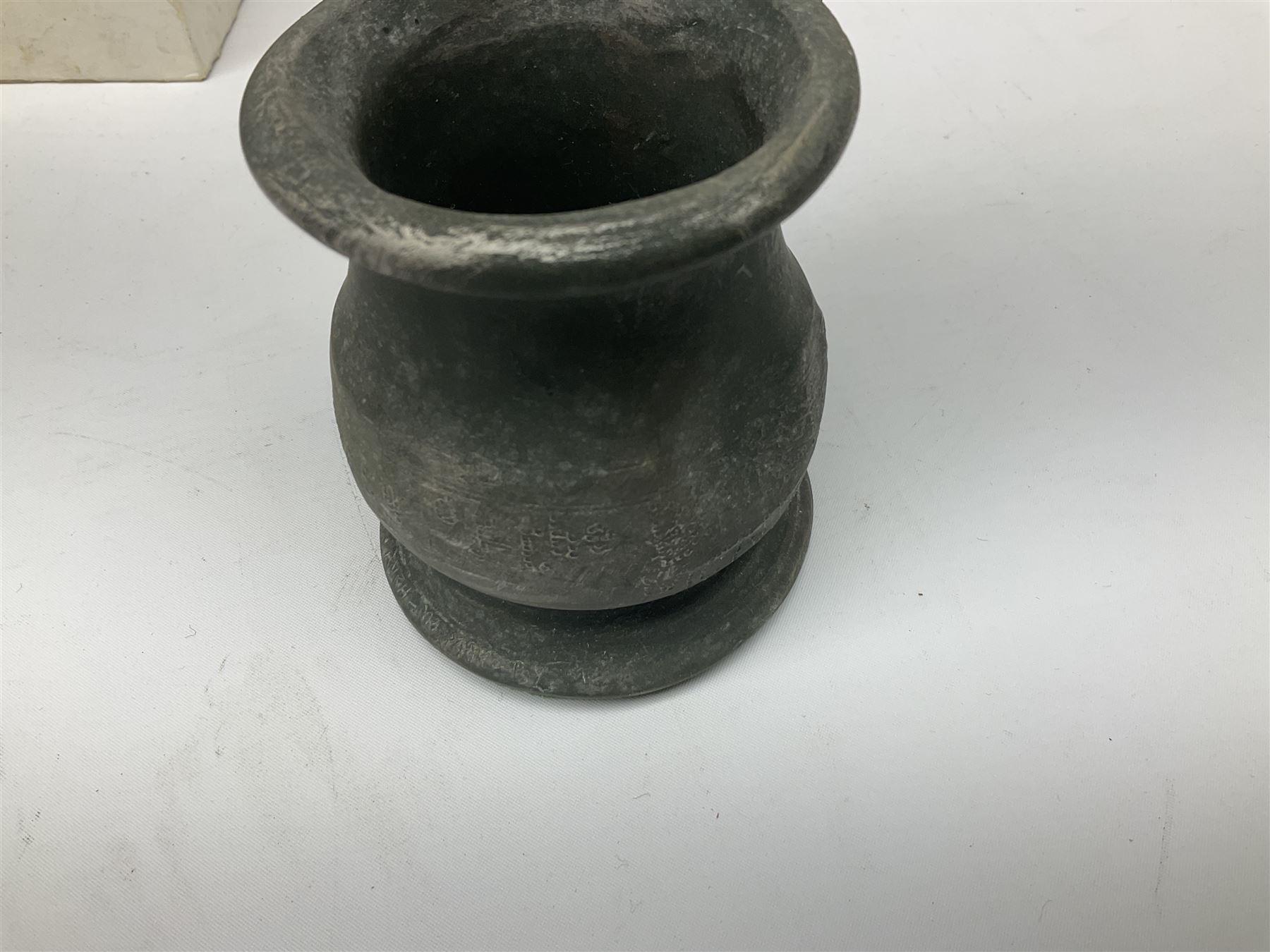 Terry Pratchett Discworld figures, comprising Roderick the hippo, DWE2, a 1995 event piece, Rincewind bookend, DW11, Death bookend, DW12, Librarians wizard knob, boxed, DW55, the luggage, boxed, DW04, tankard from the mended drum, DW21, Teppic the assassin, DW32, Greebo, DW45, Herne the hunted, DW64, Gaspode,  DW31, Quoth on skull, DW49 and Dibbler's compass DW16. 