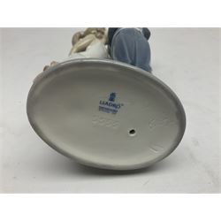 Two Lladro figures, comprising Now & Forever no 7642 and Kiss & Make Up no 5555, largest example H28cm