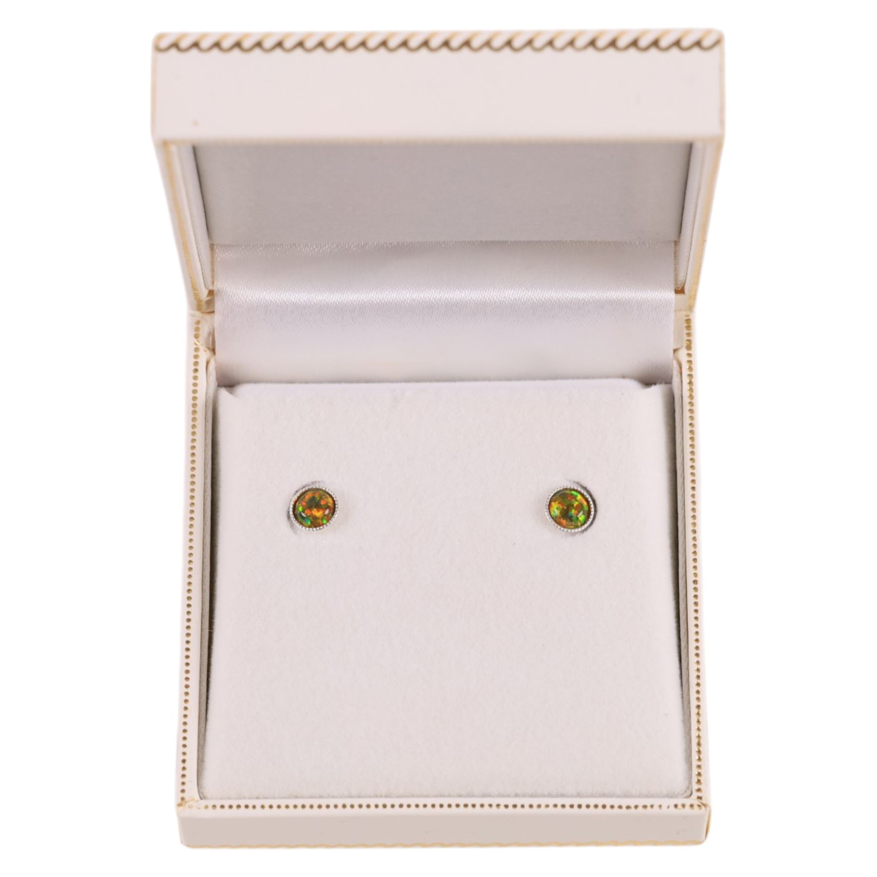 Pair of silver opal stud earrings, boxed, D5mm