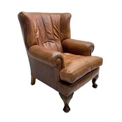 Tetrad - 'Blake' club armchair, fanned wingback and rolled arms upholstered in tan brown leather, on ball and claw carved cabriole feet 