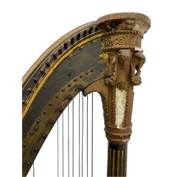 J. Erat. Wardour Street, London, Soho - Regency parcel-gilt and rosewood finish pedal harp, forty-three strings and five swell doors, the fluted pillar decorated with rams head capital, floral festoons, anthemion motifs and sarcophagi, the base decorated with pharaonic motifs and fitted with eight brass pedals, on carved paw feet, brass signature plate to top inscribed 'J. Erat. Wardour Street, London, Soho, 606'