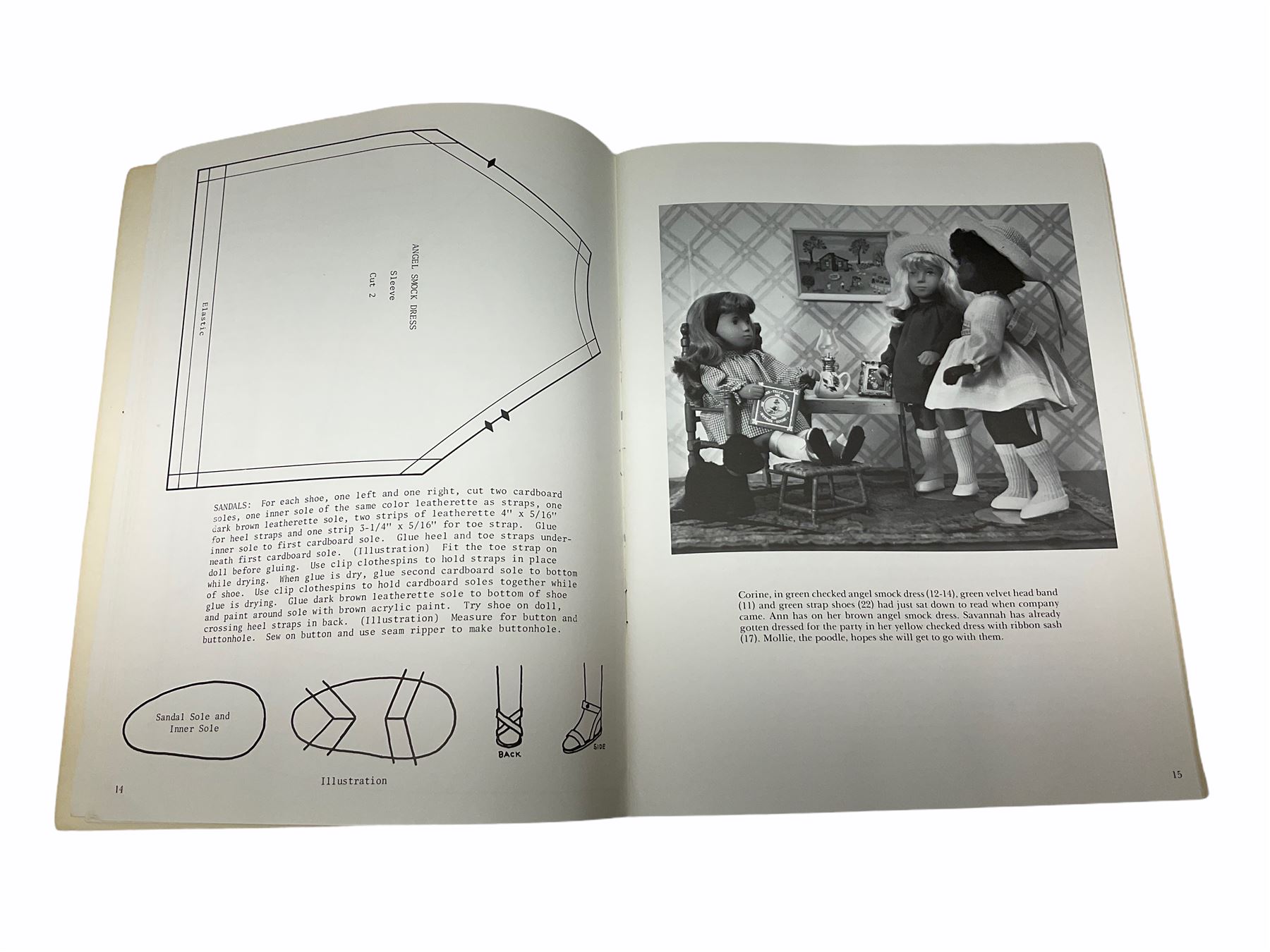 Heidi Ott doll in tartan dress, navy floral dress with white lace and ribbon detailing, striped blue and white dress and a 'Head to Toe' book