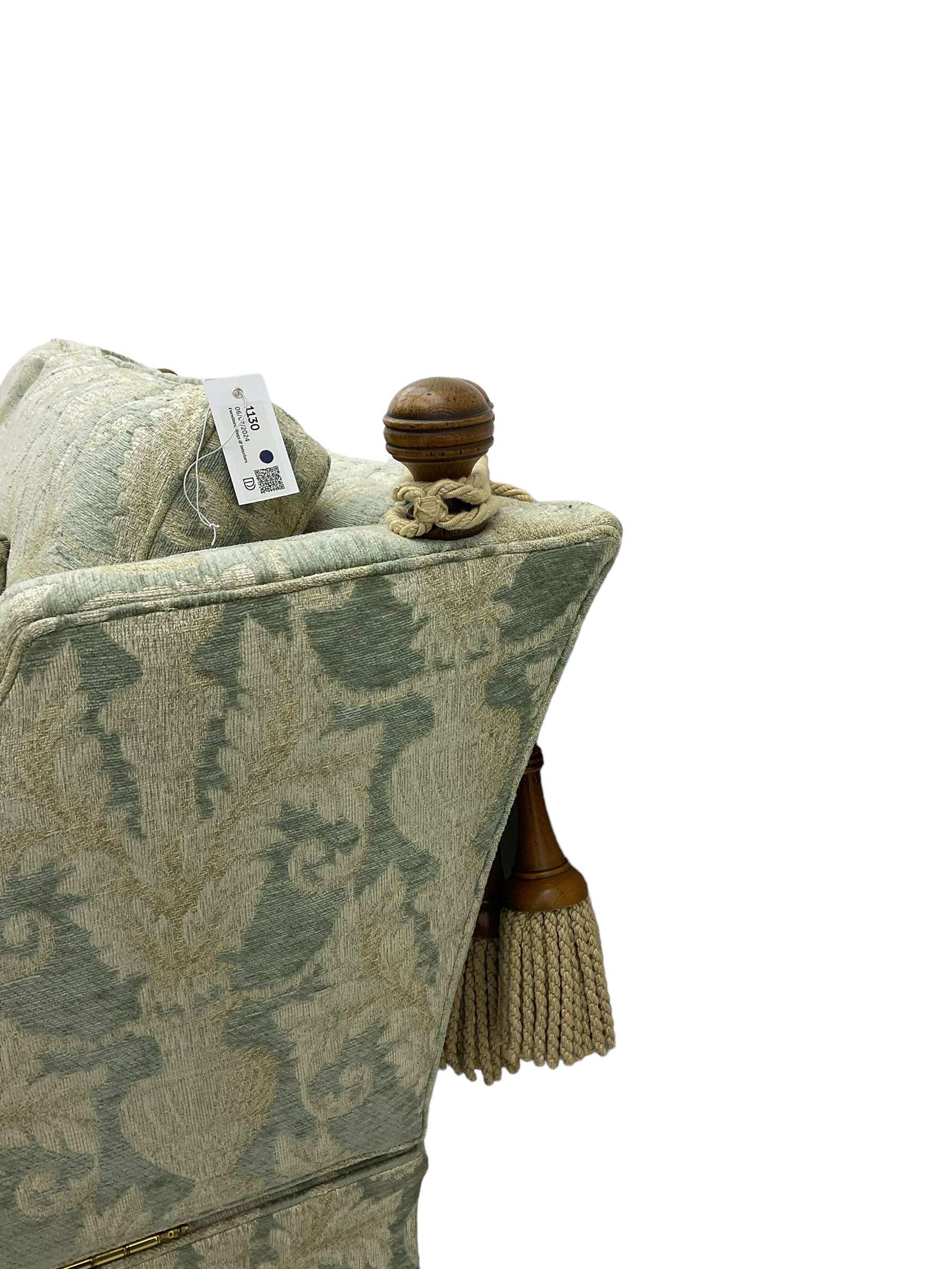 Three-piece hardwood-framed lounge suite - large two-seat Knole sofa with drop ends, upholstered in patterned fabric decorated with urns and foliage (W190cm, D117cm, H88cm); armchair upholstered in contrasting geometric pattern fabric (W83cm, D102cm, H93cm); and another armchair (W82cm, D102cm, H92cm) (3)