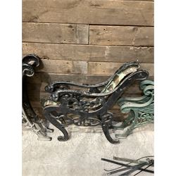 Four pairs of ornate cast iron bench ends (8)