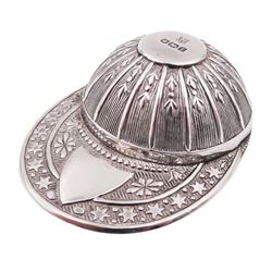 Edwardian silver caddy spoon, in the form of a jockeys cap, with embossed decoration and blank shield shaped cartouche, hallmarked Thomas Bradbury & Sons Ltd, Sheffield 1909, L5.3cm