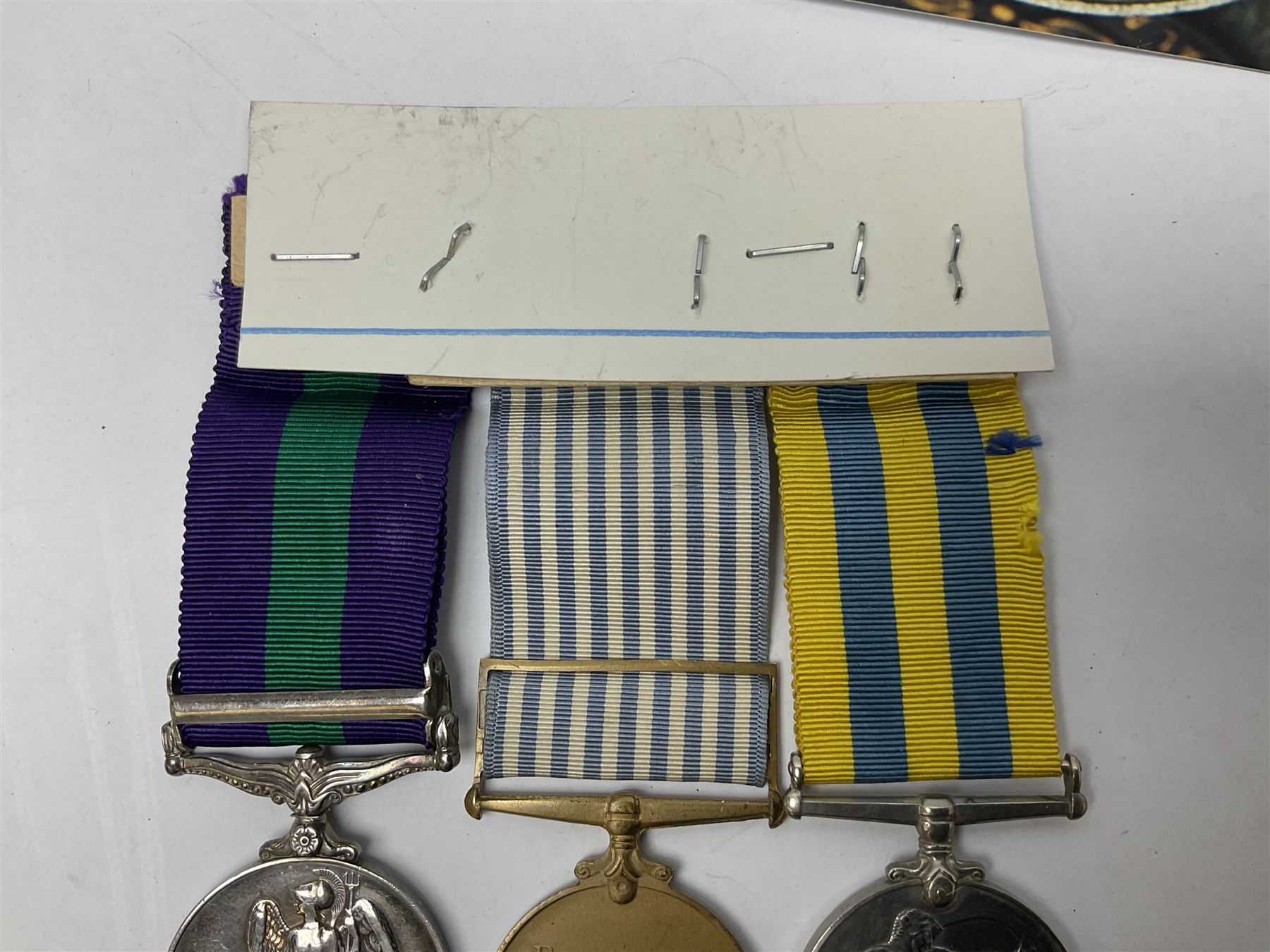 Korean War group of three medals comprising ERII Korea Medal awarded to 22307852 Pte. M. McGill R.A.M.C., UN Korea Medal and ERII General Service Medal with Malaya clasp to 22307852 Cpl. M. McGill R.A.M.C.