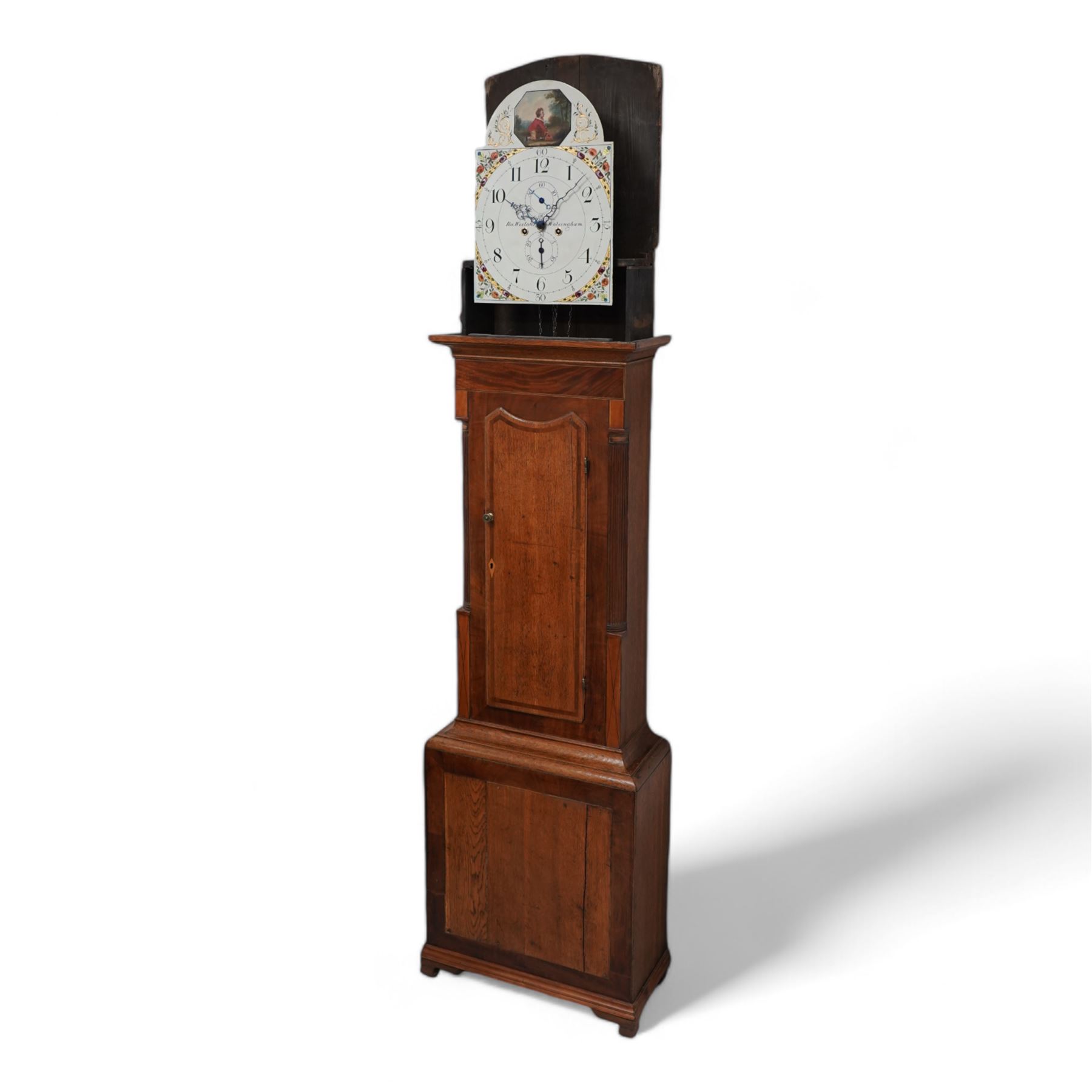Ralph Weston (III) of Wolsingham (Co Durham) - 30-hour oak and mahogany longcase clock c1815-17, With a swan necked pediment, brass parterre and central spire finial, break arch hood door beneath flanked by reeded pilasters with brass capitals, trunk with recessed reeded pilasters and a crossbanded door with a concave top, square plinth on bracket feet, painted dial with floral depiction to the spandrels and a depiction of a boy attempting to catch birds in the arch, with makers name, Roman numerals, five minute Arabic's, minute track and matching steel hands, with dummy seconds and calendar dials and dummy winding arbors, dial pinned via a cast falseplate by Whittaker & Shreeve to a countwheel striking chain driven movement striking the hours on a bell. With weight and pendulum.
Notes.
The Weston family were a prodigious three generation family of 18th and 19th century Wolsingham clockmakers, all christened Ralph. The maker of this clock Ralph (III) frequently made 30hr clocks such as this possessing features normally found on  8-day clock dials.
Both the clockmaker, clock and dial were the subject of a comprehensive five part article in CLOCKS magazine published between  Nov 2012 and March 2013. The dial of the clock being of particular interest, manufactured by the Haifax firm of Shreve and Whittaker between 1815-17 . 
William Shreeve, a highly respected and competent dial painter went into a short-lived partnership with William Whittaker in 1815, however in 1817 Shreeve died in a tragic accident whereby he was burnt to death whilst preparing some of his own paints and varnishes. 

