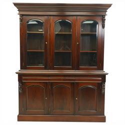 Victorian revival hardwood dresser, projecting moulded cornice above three glazed doors en...