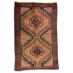 Baluchi crimson ground rug, the central 