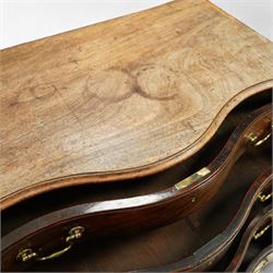 George III Chippendale period mahogany serpentine-fronted chest, shaped top with moulded edge over a deep serpentine outline with four graduated drawers, the canted corners decorated with blind-fretwork geometric decoration, fitted with brass swan-neck handles, lower moulded edge on bracket feet, circa 1760-1770