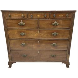 Early 19th century mahogany chest, three shallow frieze drawers over two short and three long cock-beaded drawers, canted corners with reeded moulded square columns, on ogee bracket feet