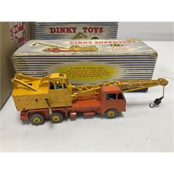 Dinky - Supertoys No.972 20-ton Lorry Mounted Coles Crane; No.752 Goods Yard Crane; both boxed; and quantity of unboxed and playworn die-cast models including motor cars, commercial and emergency vehicles, farm and agricultural vehicles, racing cars etc; and a collection of Dinky catalogues