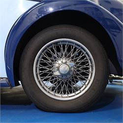 1939 MG SA Saloon

Registration: GRB 988
Chassis number: SA2983
Engine number: QPHG3242 (original engine)
Engine: 2,322cc six-cylinder petrol
Transmission: Manual
Odometer reading: 71,873 miles
Seating: Five
Colour: Two-tone blue
Former keepers: 6/7 recorded
V5C: Present
Keys: One

A 1939 MG SA Saloon, finished in an attractive two-tone blue colour scheme and retaining its original UK registration, GRB 988.

Introduced in 1936, the MG SA was the marque's prestigious sporting saloon, combining elegant coachwork with refined six-cylinder performance and luxurious accommodation. This example retains its original 2,322cc engine, numbered QPHG3242, and displays 71,873 miles on the odometer, although this mileage has not been independently verified.

The car is understood to have undergone an extensive rebuild and restoration between 2010 and 2015 and is today presented in showroom condition throughout. The coachwork has an excellent finish, complemented by outstanding chrome brightwork, wire wheels, a rear-mounted spare wheel, folding rear luggage rack and a desirable folding canvas sunroof. The engine bay is immaculately detailed, while the underside, chassis and suspension all reflect the high standard of restoration undertaken. A stainless-steel exhaust system has also been fitted.

The luxurious cabin features beautifully finished inlaid wood veneer, leather seating and period instrumentation, all presenting to an exceptionally high standard.

A particularly appealing aspect of this MG SA is its documented participation in the 1952 Daily Express National Motor Rally. Accompanying the vehicle are the original official rally programme together with period photographs showing the car competing in the event displaying entrant number 36. The programme lists entrant No. 36 in Class D.2 as an MG 2322cc, providing excellent documented provenance linking this car to one of Britain's best-known post-war motoring events, held between 12th and 15th November 1952.

Combining documented provenance with exceptional cosmetic presentation, this MG SA represents a rare opportunity to acquire one of MG's flagship pre-war sporting saloons.

At the time of cataloguing the vehicle started and ran well.

Features

• Original 2,322cc six-cylinder engine
• Manual transmission
• Original UK registration
• Two-tone blue coachwork
• Folding canvas sunroof
• Leather interior
• Inlaid wood veneer dashboard and trim
• Wire wheels
• Rear-mounted spare wheel
• Folding rear luggage rack
• Twin carburettors
• Stainless-steel exhaust system
• Extensive rebuild and restoration completed between 2010 and 2015

History and Documentation

• Approximately six to seven former keepers recorded
• Original engine (No. QPHG3242)
• Chassis No. SA2983
• Original UK registration
• Extensive rebuild and restoration completed between 2010 and 2015
• Original 1952 Daily Express National Motor Rally programme
• Period photographs showing the vehicle competing as Entrant No. 36
• V5C registration document not present
• One key

Condition

Presented in exceptional showroom condition, this MG SA has clearly benefited from a high-quality restoration completed to an impressive standard. The paintwork, chrome, interior, engine compartment and underside are all exceptionally well presented, reflecting the considerable work undertaken.

The vehicle started and ran well at the time of cataloguing. It has not been subjected to a full mechanical inspection by the auctioneers, and prospective purchasers should satisfy themselves as to the vehicle's condition, originality, mileage, specification and roadworthiness prior to bidding.

This vehicle forms part of the Estate of the late John Sills and is offered for sale by the Executors, providing a genuine reason for sale.