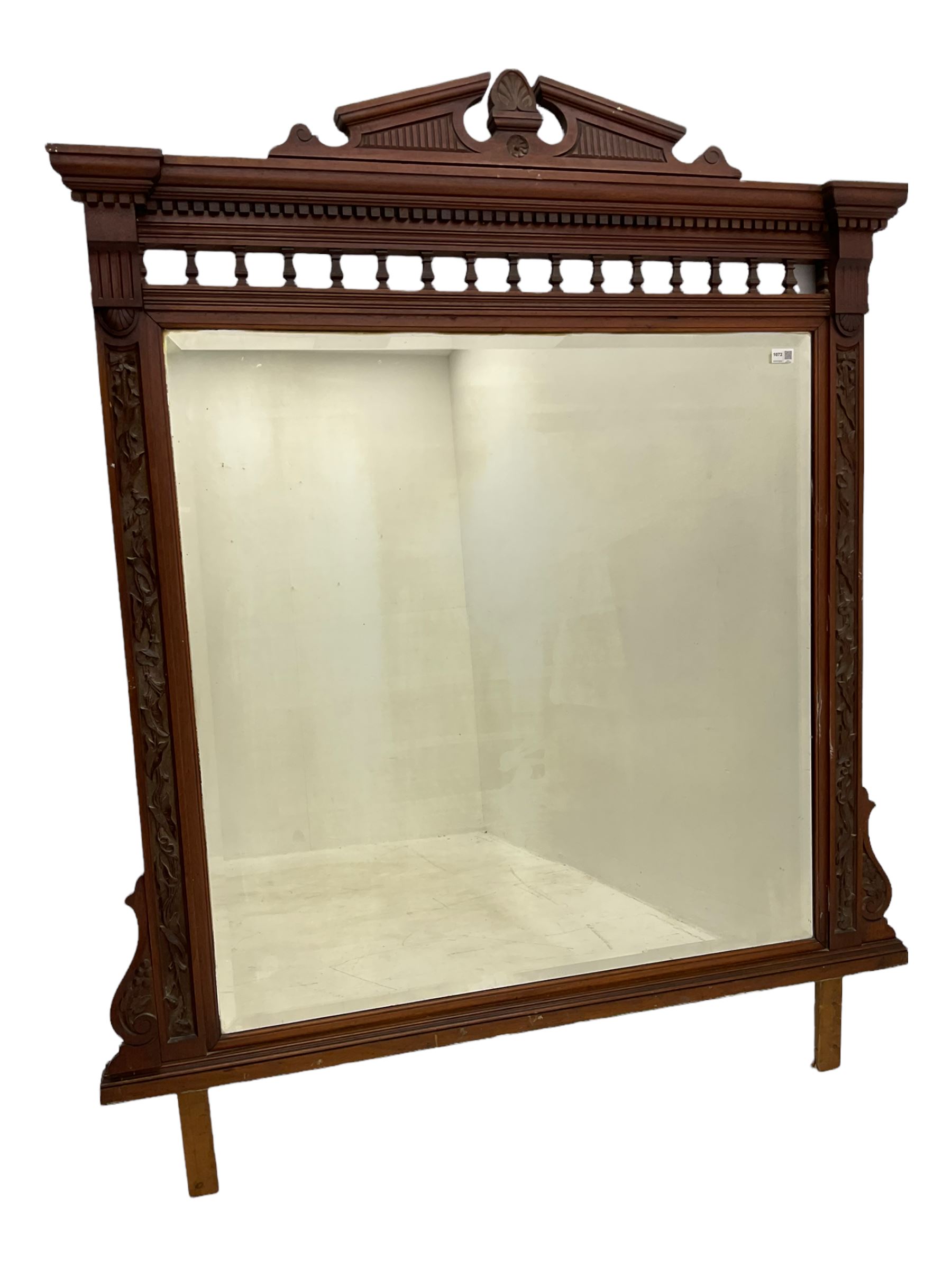 Edwardian walnut over-mantle mirror, bevelled plate