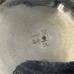 Early/mid 20th century Persian silver tea service, comprising circular serving tray, teapot, twin handled sucrier and cover, milk jug, five tea glasses with six silver holders, six tea spoons, and pair of sugar tongs, each profusely chased with foliate arabesque decoration, each bearing marks including 84 for 840 fineness, tray D40cm, teapot H16cm
