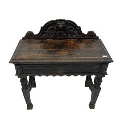 Victorian heavily carved oak side table, single frieze drawer