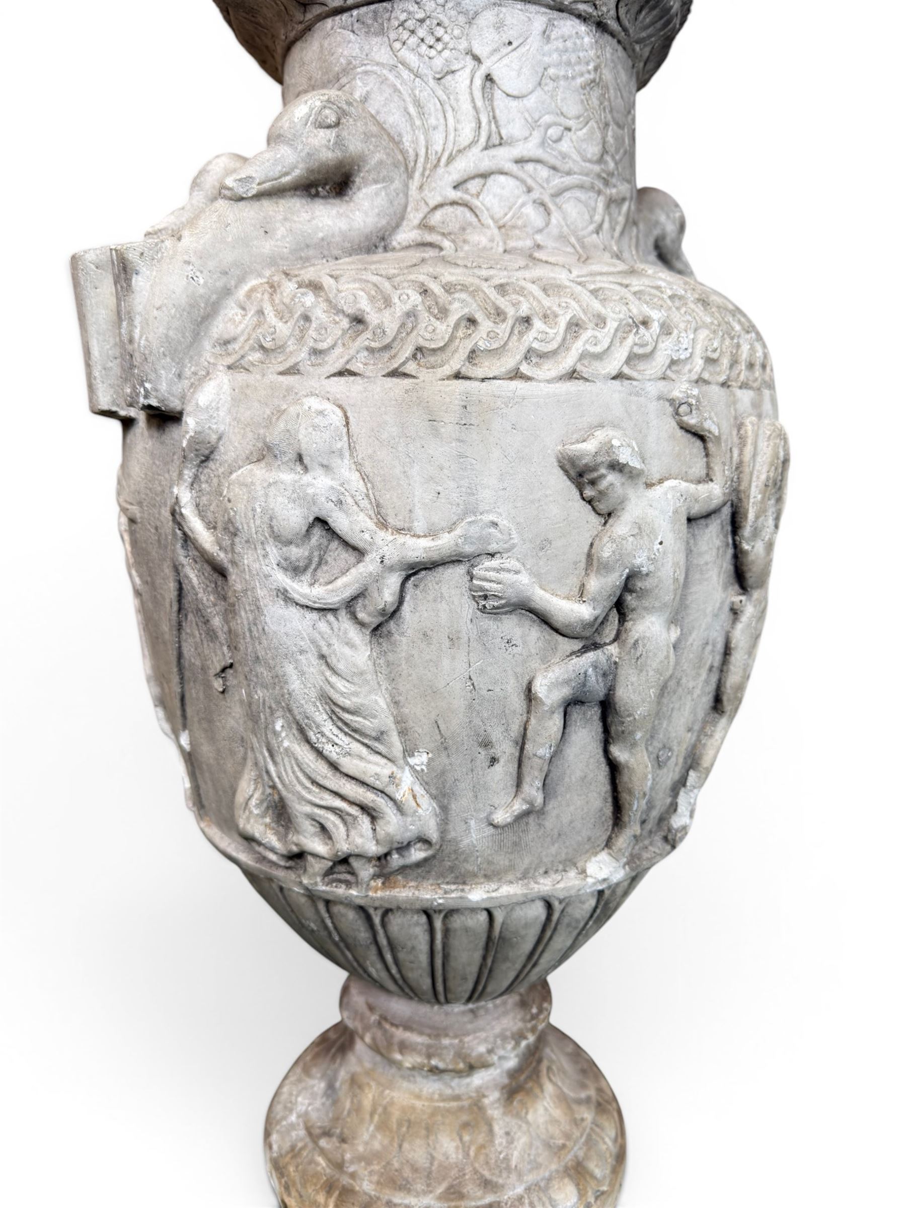 Early 20th century painted plaster classical urn, detailed with swan necks and mythical scenes