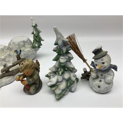 Winter Hummelscape by Goebel and twelve winter Hummel figures, including Letter to Santa and Peaceful Offering, tallest H18cm