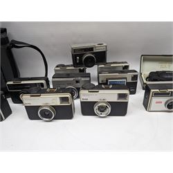 Canon EOS 650 camera, serial no 2122736, in carry case with some accessories, together with an Olympus XA2 camera and ten Kodak Instamatic cameras and two similar