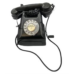 Vintage Bakelite ATM black telephone, with chrome dialing wheel
