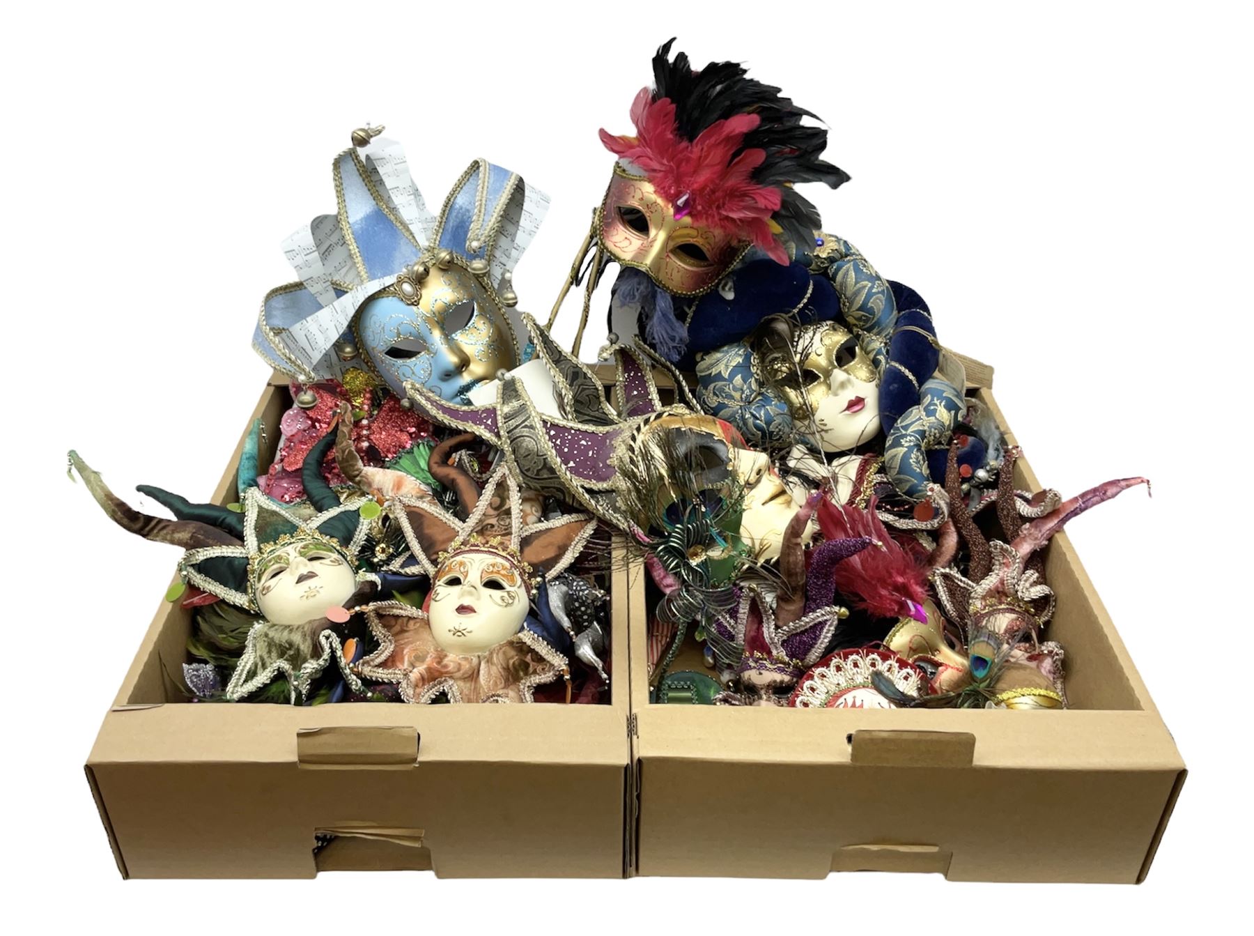 Large collection of decorative Venetian masks, to include two bearing tags for La Maschera Del Galeone, in two boxes 
