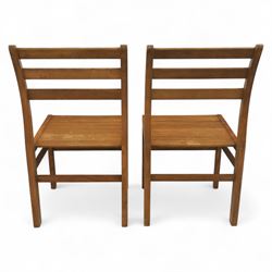Treske of Thirsk - solid oak refectory dining suite, rectangular top with chamfered edge over trestle base united by a central stretcher, together with six matching slat back dining chairs, including two carvers, with panelled seats and square legs united by stretchers (H 87cm, W 62cm, D 57cm)