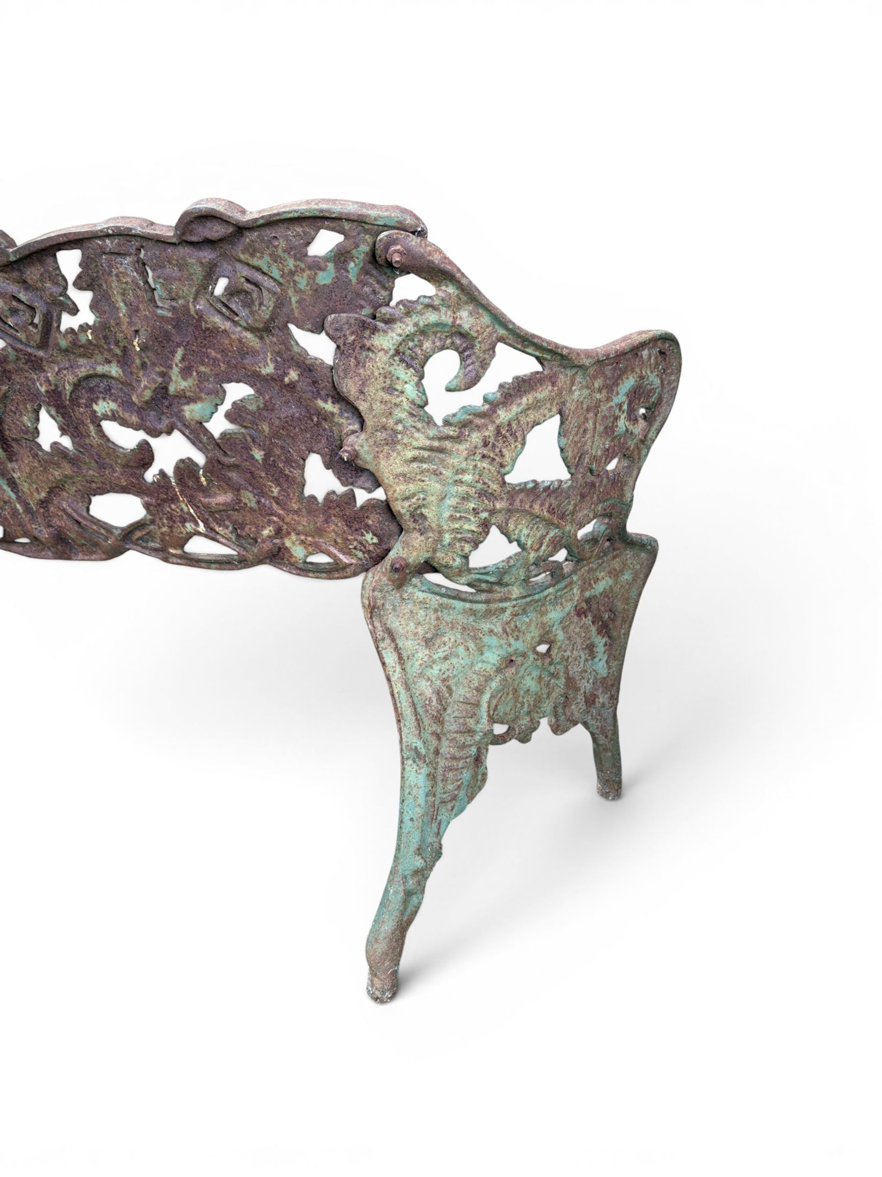 Victorian naturalistic design heavy cast iron garden bench, well defined fern pattern curved back-rest with arms, lacking seat slats for restoration
