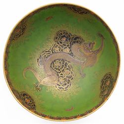 Carlton Ware bowl on stand decorated with Oriental dragon on a green and gilt ground D24cm