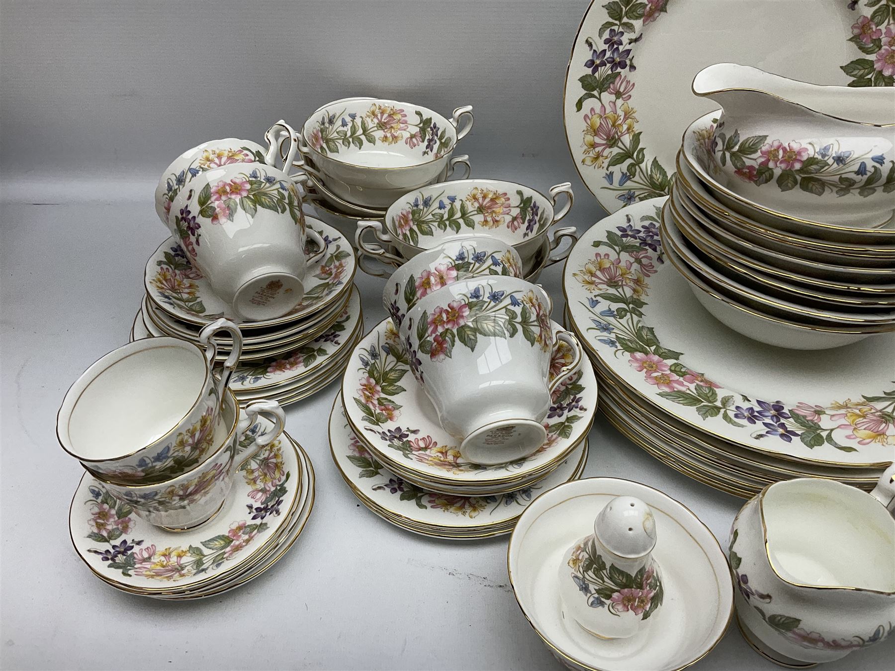 Paragon Country Lane part tea and dinner service, including eight tea cups and saucers, nine dinner plates, eight bowls, eight twin handled soup bowls, salt and pepper shakers etc (approx 80) 